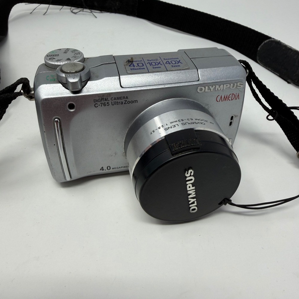 Olympus Camedia C-765 Ultra Zoom 4.0MP Digital Camera Silver 10x Optical Zoom